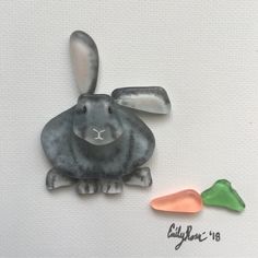 a painting of a bunny and carrots on a white background