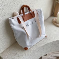 Brand Name: MR.YLLSShape: Casual ToteHandbags Type: Shoulder BagsTypes of bags: Shoulder HandbagsOrigin: CN(Origin)Main Material: CanvasClosure Type: zipperHardness: SOFTExterior: NONEStyle: CasualOccasion: VersatileGender: WOMENPattern Type: SolidNumber of Handles/Straps: SingleInterior: Interior Slot PocketInterior: Cell Phone PocketDecoration: NONEItem Type: HandbagsColor: black women bag,beige women bagbag 1: luxury handbags women bags designerbag 2: casual canvas messenger bag for womenbag Messenger Bag Women, Backpack Clothes, Men Wallet, Leather Patchwork, Women Wallet, Rfid Wallet, Canvas Messenger Bag, Womens Handbags, Backpack Women