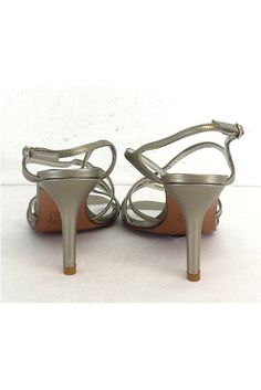 Size 6 M Silver Strappy Heels Made in Spain Adjustable ankle straps Heel height 3.75" Formal Ankle-high Heels With Buckle Closure, Elegant Spring Heels With Padded Ankle, Fitted Strappy Heels With Round Toe, Ankle-high Heels With Removable Insole For Party, Ankle-high Synthetic Heels For Formal Occasions, Spring Evening Heels With Padded Ankle, Ankle-high Synthetic Sandals For Formal Occasions, Strappy Medium Width Heels For Formal Occasions, Formal Ankle-high Sandals With Padded Heel