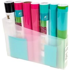 several different colored papers in a clear holder