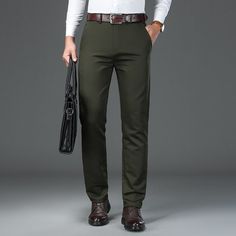 This trouser for men is designed with a pocket and looks very novel. It is styled from superior-quality broadcloth fabric. This trouser has a high waistline that offers a comfortable fit. It also makes for a smart autumn and winter wardrobe investment. This trouser gives a great fit and has a zipper fly closure. Specifications Waist Type: HIGH Waist Size(in inches): 11 - 16.5 Thickness: Midweight Style: Smart Casual Place Of Origin: China (Mainland) Pant Style: Straight Origin: Mainland China Mo Trouser For Men, Men's Casual Fashion, Broadcloth Fabric, Casual Pants Style, Business Pants, Men Street, Straight Trousers, Men's Casual, Winter Wardrobe