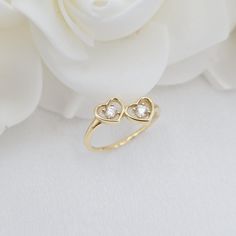 Stunning Solid 14k Gold Double hearts ring. Adorable, meaningful, and versatile. Crafted with 100% real 14k Gold. Ideal for everyday or special occasion. 14k Gold will not tarnish or rust. Materials: 14k gold Size: 5 to 11 US Band width: 1mm Heart size: 7x6mm Weight: 1.6 grams (depending on the size) 14k stamped Brand new  💓 Briza Collections is a small family owned business that works hard on providing the best selection of Fine Solid Gold Jewelry for the best prices.  Our Goal is to bring you happiness and satisfaction, for this reason if you are not satisfied with your purchase we will accept Refunds and exchanges. In order to get a refund let us know within 14 Days after you received the package and i will give you the details on how to proceed, please have in mind that the buyer is r Double Heart Ring, Double Heart, Solid Gold Jewelry, Jewelry For Her, Small Family, Rings Statement, Statement Rings, Heart Ring, Solid Gold