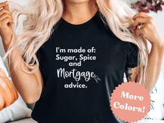 a woman with blonde hair wearing a black t - shirt that says i'm made of sugar, spice and marriage advice