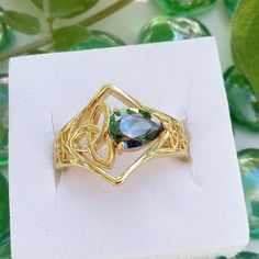 This Unique Celtic Design Ring Features A Green Mystic Topaz Pear Cut Stone Setting Is Silver Plated In Gold. Gift Box Fast Shipper * Gold Topaz Ring Gift, Unique Gold Topaz Ring For Gift, Mystical Green Rings Perfect For Gifts, Spiritual Style Topaz Gemstone Ring As A Gift, Spiritual Topaz Gemstone Ring As Gift, Spiritual Gift Topaz Ring With Gemstone, Green Topaz Ring May Birthstone Gift, Green Topaz Ring For May Birthstone Gift, James Avery Rings