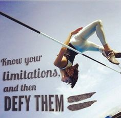 a woman is high in the air while balancing on a tightrope with an inspirational quote above her