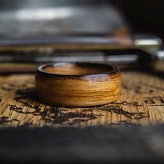 a wooden ring sitting on top of a table