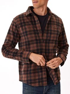 Made from recycled plastic, this Fleece Button Up is the perfect sustainable layer to add to your winter wardrobe. Winter Plaid Cotton Flannel Shirt, Casual Wool Flannel Button-up Shirt, Plaid Relaxed Fit Button-up Outerwear, Brown Button-up Flannel Shirt For Outdoor, Cotton Patchwork Button-up Flannel Shirt, Polar Fleece, Heather Black, V Neck Tee, Fleece Hoodie