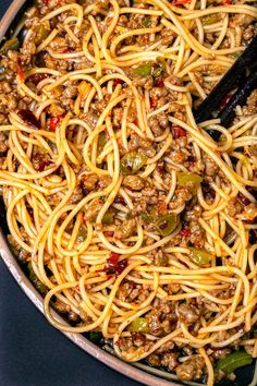 a pan filled with noodles and meat