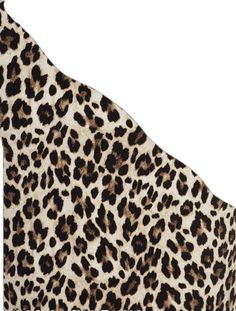 an animal print pillow on a white background