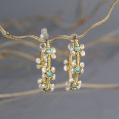 Hoop Earrings, Bezel Earrings, Turquoise Pearl Flower Hoop Earrings, Wire Wrapped Gemstone Earrings, Fine Earrings Turquoise hoop earrings bezel set in sterling silver with delicate gold filled wire wrapped. Flower hoop earrings will light up your look, and would look great with your hair down. Materials: Stone: turquoise or eilat stone, freshwater pearl Metal: sterling silver, gold filled Hook: sterling silver Measurements: Stone size: 3mm Total length: 3.2cm Total widthL 3cm Since I use natura Elegant Handmade Turquoise Hoop Earrings, Elegant Turquoise Hoop Earrings, Christmas Jewelry Diy, Work Earrings, Wire Wrapped Turquoise, Flower Hoop Earrings, Earrings Pattern, Turquoise Hoop Earrings, Eilat