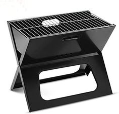 a black barbecue grill sitting on top of a white surface