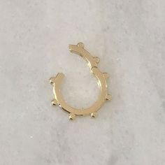 "This uniquely handcrafted charm pendant enhancer is composed entirely of 14K solid gold. NOTE: This specific listing is for merchandise that we have available in stock & ready to ship. If you are interested in purchasing this item with more quantities kindly click the following link for your convenience: https://www.etsy.com/listing/744724857/14k-solid-gold-enhancer-round-charm?ref=shop_home_active_35&frs=1 ♦ Enhancer Dimensions: approximately 11mm (outer diameter) x 8mm (inner diameter Unique 14k Gold Tarnish Resistant Jewelry, Unique 14k Gold Tarnish-resistant Jewelry, Unique Tarnish Resistant 14k Gold Jewelry, Gold Huggie Jewelry With Lobster Clasp, Nickel-free 14k Gold-tone Jewelry, Gold-tone Nickel-free 14k Gold Jewelry, Unique Hypoallergenic Gold Jewelry, Horn Earrings, Charm Holder