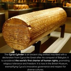 an image of a wooden object on display in a museum with caption that reads, the culpier is an ancient daily artifact inscribed with a declaration