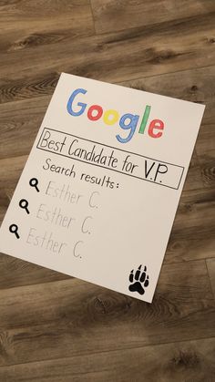 a sign that is on top of a wooden floor with the words google and best candidate for vp