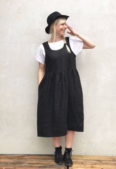 "Simple and comfortable linen pinafore sundress with handy pockets. Wear it alone or with a shirt underneath.  Easy to dress it up or down with a few accessories.  Great linen texture and drape.  Very comfortable and perfect for everyday wear as well as more special occasions. High quality linen with adorable texture.   Made from a 100% medium weight, natural European linen. The linen will become more distinctive the more you wear and wash it.  Each piece is individually cut, sawn and pre-washed Dress With Shirt Underneath, Linen Pinafore Dress, Plus Size Sundress, Linen Pinafore, Black Sundress, Linen Sundress, Sukienki Plus Size, Linen Dress Women, Linen Texture