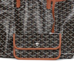 This Goyard Saint Louis PM bag is in black Goyardine canvas and tan chevroches calfskin, with palladium hardware, contrast stitching, and has a matching detachable button closure wallet. The interior is lined with white canvas.Origin: FranceCondition: New and never worn (plastic on handles)Accompanied by: Dustbag, felt, retail tag, detachable wallet and carebookMeasurements: 13.3" x 11" x 6"; 7" shoulder strap Goyard St Louis Pm, Goyard Saint Louis Pm, Goyard Saint Louis, Hermes Birkin 25, Birkin 25, Saint Louis, White Canvas, Black And Tan, St Louis