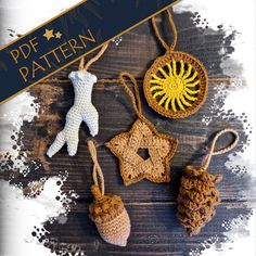 four crocheted ornaments hanging from strings on a wooden surface with the text free pattern