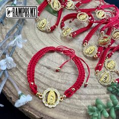 "Beautiful Mexican Red Handmade Gold Woven \" Our Lady of Guadalupe Unisex bracelet \"Virgen de Guadalupe\" with the company of San Benito Symbol is Handmade braided Design by our Artisan Team to create a beautiful Stylish ,protection and positive accessory , definitely a must have in your religious Catholic Bracelet Collection :) ( One bracelet per order) Color can change slightly depending on the device screen thats been viewed on. Bracelet has and adjustable : One size Fits All Unisex Brazale Adjustable Red Bracelet As Souvenir, Handmade Adjustable Bracelets For Celebration, Handmade Adjustable Bracelet For Celebration, Handmade Red Bracelet As Souvenir, Handmade Red Bracelet Souvenir, Red Spiritual Bracelets For Wedding, Red Spiritual Bracelet For Wedding, Red Spiritual Wedding Bracelets, Spiritual Our Lady Of Guadalupe Bracelets As Gifts