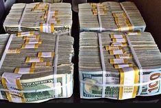 stacks of money sitting on top of each other