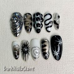 Custom Black Press On Nails, Gothic Punk Rock Nails, Snake Goth White Y2K Press On Nails bring a touch of nostalgia and futuristic style to your fingertips. With a wide range of colors, designs, and finishes, these press on nails allow you to express your individuality and stay on top of the latest trends. Whether you prefer bold and vibrant shades or subtle and sophisticated designs, DarkNailz press on nails offer endless possibilities for creating your desired look. [PLEASE READ BEFORE PURCHASING] All sets are made with GEL nail polish. These nails are reusable, if you take it off right. For instruction, please message me. Each set comes with 10 handmade press on nails, double-side gel nail glue, a mini buffer, a cuticle stick, a prep pad. 1. Measurements Please measure your own nail and Nails With Gel Designs, Medium Length Goth Nails, Dark Core Nails, Dystopian Nails, Press On Nails Goth, Gothic Inspired Nails, White Silver And Black Nails, Smokey Black Nails, Simple Alternative Nails