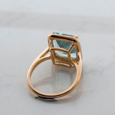 Wonderfully Blue Retro style Gold Ring. This ring has Tons of presence and elegance. the light blue gemstone captures the sun and adds extra shine to this ring. It crowns your finger demanding to be noticed in such an elegant manner. This ring is made to order in any size you choose, Please select from the menu on this page before checkout. Size over 9.5 (us) Are priced differently, Please contact first for details Ring Features: *Made to Order with with the utmost attention to details then care Rectangular Ring, Light Blue Gemstone, Square Stone, Diy Wire Jewelry, Detailed Ring, Swiss Blue Topaz, Blue Gemstones, Topaz Gemstone, Something Blue