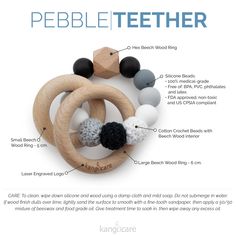 the pebble teeth ring is made with wood and beads