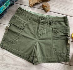 Y2k / early 2000s mid-rise button fly cargo shorts by The Limited.  Good overall condition, with some wear on the fabric and a few small scuffs here and there. Labeled size 2 (see measurements): Measurements (laid flat): Waist: 14" Hips: 19.5" Rise: 11.5" Inseam: 3.5" Length: 12.25" Leg width at bottom: 12" Summer Thrift, Green Cargo Shorts, Short Cargo, Y2k Early 2000s, Clothing Pieces, Shorts Cargo, Early 2000s, Label Sizes, The Limited