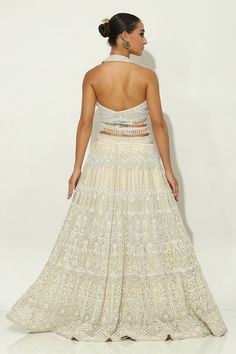 Ivory lehenga featuring floral motifs embellished by pearls, sequin and zircons on a shimmer base. Comes with padded bead embellished tasselled blouse and ruffle dupatta. - Aza Fashions Floral Bridal Lehenga, Ivory Lehenga, Ruffle Dupatta, Lehenga Pattern, Floral Bridal, Bridal Lehenga, Floral Motifs, Set For Women, Aza Fashion