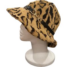 1960s Adolfo Ralits Leopard Print Faux Fur Fedora W/ Buckled Band A Sexy, Lush 1960s Adolfo Ralits Leopard Print Faux Fur Fedora With Down-Turned Brim And A Narrow Leather Band With Silver Buckle. Red Grosgrain Band And Structural Pinning Inside. Size Medium. First Owner Fast Shipping No Pets No Smoke Household Designer Adolfo Brand Adolfo Realities Dimensions Marked Size: Medium (Us) Style Avant Garde (Of The Period) Place Of Origin United States Period 1960-1969 Condition Vintage Excellent Vintage 1960s, Leather Band, Vintage Accessories, Black And Tan, Fedora, Lush, Leopard Print, Faux Fur, 1960s