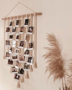 a wall hanging with pictures and photos on it