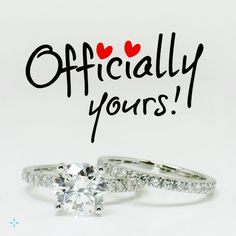 two engagement rings with the words officially yours