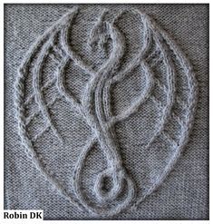 an image of a knitted object with the words robin dk written on it