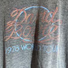 the back of a gray shirt that says, david brown 1970 world tour