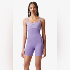 Brand Bandier X Lacoste Model Short Catsuit Workout Romper Beautiful Quality! Lacoste-Bandier Alligator Symbol In Front In Contrast Green Material See Label Color Bi Color Lilac Lavender Incorporated Sports Bra Condition New With Tags Size Medium Measurements Pit To Pit 15-15.5” Stretch Waist 13” Stretch Length Shoulder To Crotch 28” Stretch Inseam Length 6” 5 Star Seller - 5.000+ Items Sold - Fast Shipping - Closets Of Influencers And Fashion Collectors- Shop With Confidence - Smoke-Free Clean Workout Romper, Chambray Romper, Pilates Princess, Lilac Lavender, Princess Aesthetic, Green Material, Purple Fashion, Catsuit, Chambray