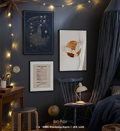 a bedroom decorated with string lights and posters