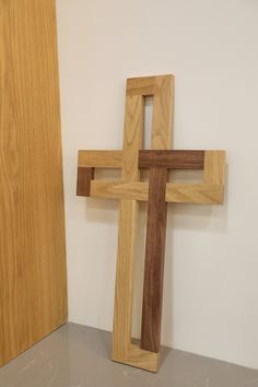 a wooden cross sitting on top of a table