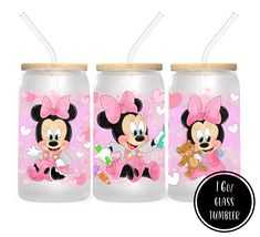 two minnie mouse water bottles with straws in them