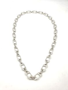 "Handmade necklace. Necklace made of very high quality silver plated Spanish Zamak. All the findings have 8 micras sterling silver coat/plated.The chain is made 2.5 x 1.5 cm wide shackles. Zamak is an alloy of zinc, aluminium, magnesium and copper. It is a hypoallergenic material, very resistant and covered by 8 micras sterling silver coat. You can clean it with a cleaning cloth. Shiny necklace for any elegant and modern look. Made in Spain. All our products are handmade. Small variations can oc Modern Silver Chunky Chain Necklace, Silver Link Necklace With Chunky Chain, Silver Oval Link Metal Necklace, Chunky Metal Oval Link Necklace, Silver Chunky Metal Chain Necklace, Silver Metal Necklace With Chunky Chain, Silver Sterling Chunky Chain Necklace, Silver Chunky Chain Long Necklace, Silver Metal Cable Chain Necklace