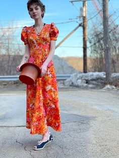 "Extreme Bight Mood Puff Sleeve 70s Hawaiian Print Orange and Pink Spring Maxi Dress. Here comes the sun. In excellent condition with no flaws of note. No tags. Feels synthetic. Back vinyl zip with hook and eye at neck. So beautiful Bust 31\" Waist 24\" Hip 36\" Length 49\" Please message me with questions before purchasing. All sales are final and ship fast from the Vermont shop. Find us on Instagram @anasclosetfullofcolor Thankyou! More vintage dresses here: https://www.etsy.com/shop/anastasia Vintage Summer Maxi Dress With Retro Print, Retro Summer Maxi Dress In Vintage Style, Retro Vintage Summer Maxi Dress, Retro Short Sleeve Maxi Dress For Beach, Retro Short Sleeve Maxi Dress For The Beach, Vintage Short Sleeve Dresses For Vacation, Vintage Red Dress For Vacation, Retro Summer Maxi Dress With Vintage Print, Retro Vintage Print Maxi Dress For Summer