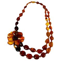 Flower Amber Necklace Natural handmade polished Baltic Amber two strand necklace. Elegant amber flower about 2 inch diameter necklace About 22.5 inch total length, almost 64.35 grams in weight. Three Strand Necklace, Malachite Necklace, Lapis Lazuli Necklace, Necklace Elegant, Citrine Necklace, Coin Pearls, Semi Precious Beads, Tourmaline Beads, Amber Necklace