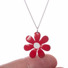 The red flower pendat is set in enameled stainless steel base.  It is hand-painted.We also make these matching red flower earrings:https://www.etsy.com/listing/624110752______________________________________________________________Enjoy more jewelry from the CinkyLinky collection at www.etsy.com/shop/CinkyLinky______________________________________________________________Thank you for visiting us! Silver Jewelry With Glossy Finish For Gift, Glossy Enamel Jewelry Gift, Metal Flower Necklace For Gift, Red Flower Necklace For Gift, Red Flower Charm Necklace As A Gift, Red Flower Necklaces For Gifts, Red Flower Necklace With Charm As Gift, Red Flower Pendant Jewelry As Gift, Red Flower Charm Necklace For Gift