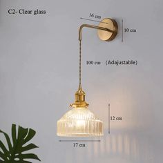 an image of a wall light that is on the side of a wall with measurements