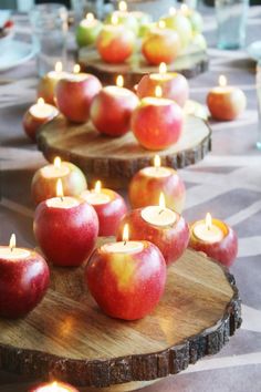 an image of apples with candles in them