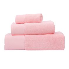 three pink towels stacked on top of each other