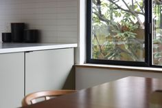 an empty table in front of a window