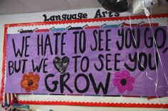 a bulletin board with words and flowers on it