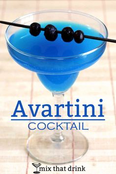 a blue cocktail with black olives in it and the words avartini cocktail mix that drink