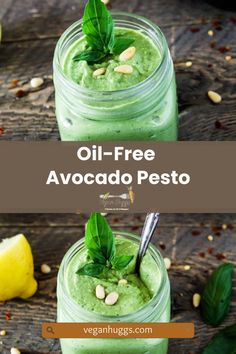 two jars filled with green pesto and topped with basil leaves