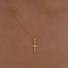 Our 14K Solid Gold Cross Necklace is meticulously designed for women and is also suitable for girls of all ages. This Christian necklace, with its crucifix pendant, is the perfect gift for girls, whether you're commemorating a special occasion or simply expressing your faith. PRODUCT DETAILS: Material: 14K Solid Gold Gemstone: Cubic Zirconia Closure: Spring ring Chain style: Cable Style: Minimalist Gold Cross Necklace For Women, Location Names, Cross Necklace For Women, Witch Pendant, Tiny Cross Necklace, Dainty Cross Necklace, Cross Necklace Sideways, Mens Cross Necklace, Witch Necklace