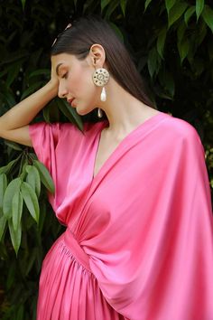 Colour : Bubble Gum PinkFabric : SatinDetails :Kimono sleeves, Fitted Waist, Side Zip & Hook for closure.Length : 59 inchesTHE MEASUREMENTS ARE IN INCHES Shoulder Bust Waist Low Waist Hips Armhole Extra Small 14 34 27 29 38 14 Small 14.5 36 29 31 40 15.5 Medium 15 38 31 33 42 16.5 Large 15.5 40 33 35 44 17.5 XL 16 42 35 37 46 18.5 XXL 17 44 37 39 48 19.5 Care• Dry Clean Only• Do Not Bleach• Steam Iron OnlyThis item is Made-To-Order. Please allow up to 21 working days for us to make your bespoke Drape Sleeves, Kaftan Dress, Kimono Sleeve, Bespoke Design, Photographic Lighting, Destination Weddings, Low Waist, Sewing Inspiration, Bubble Gum